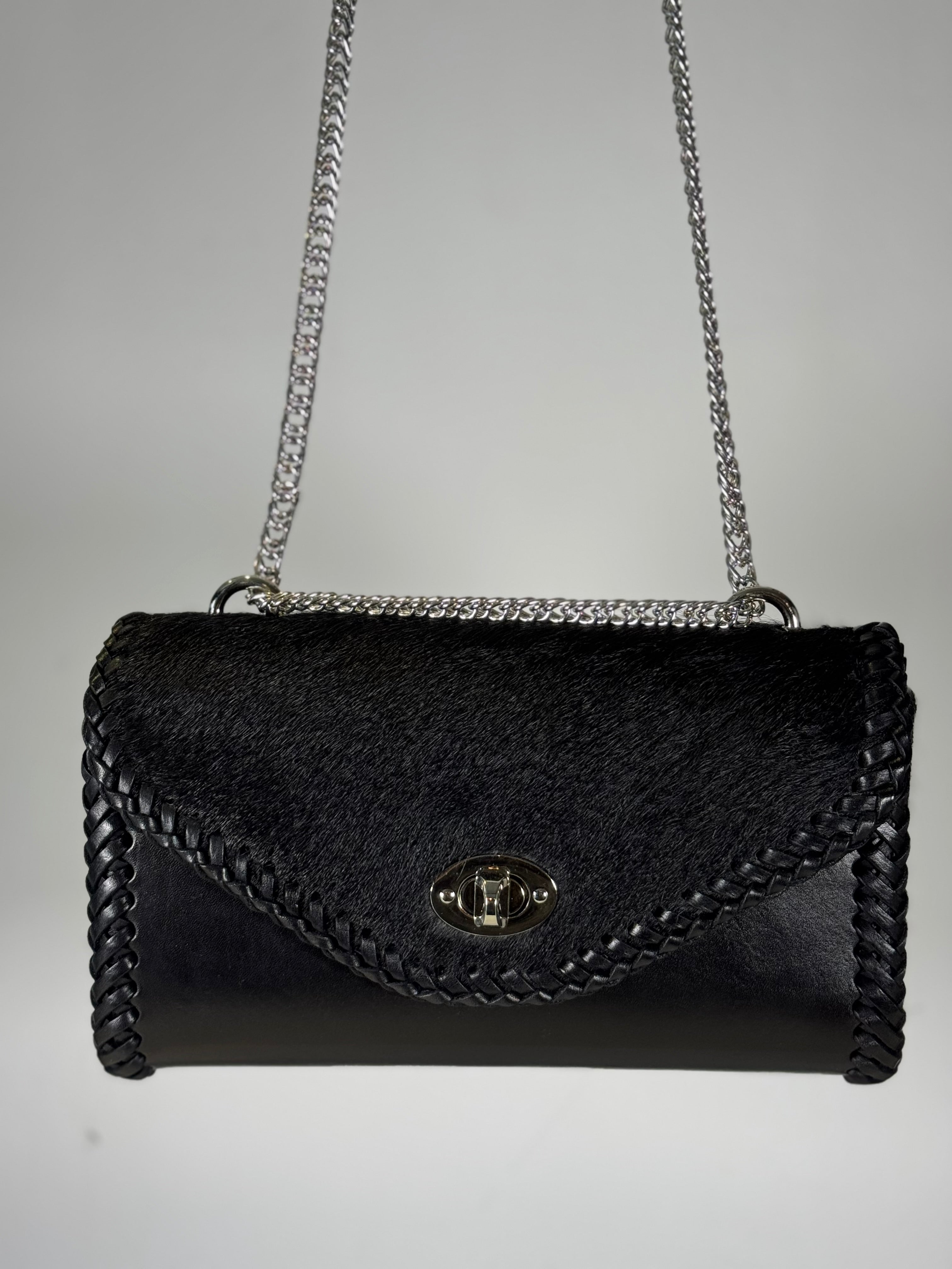 ITZEL HOLSTEIN BLACK