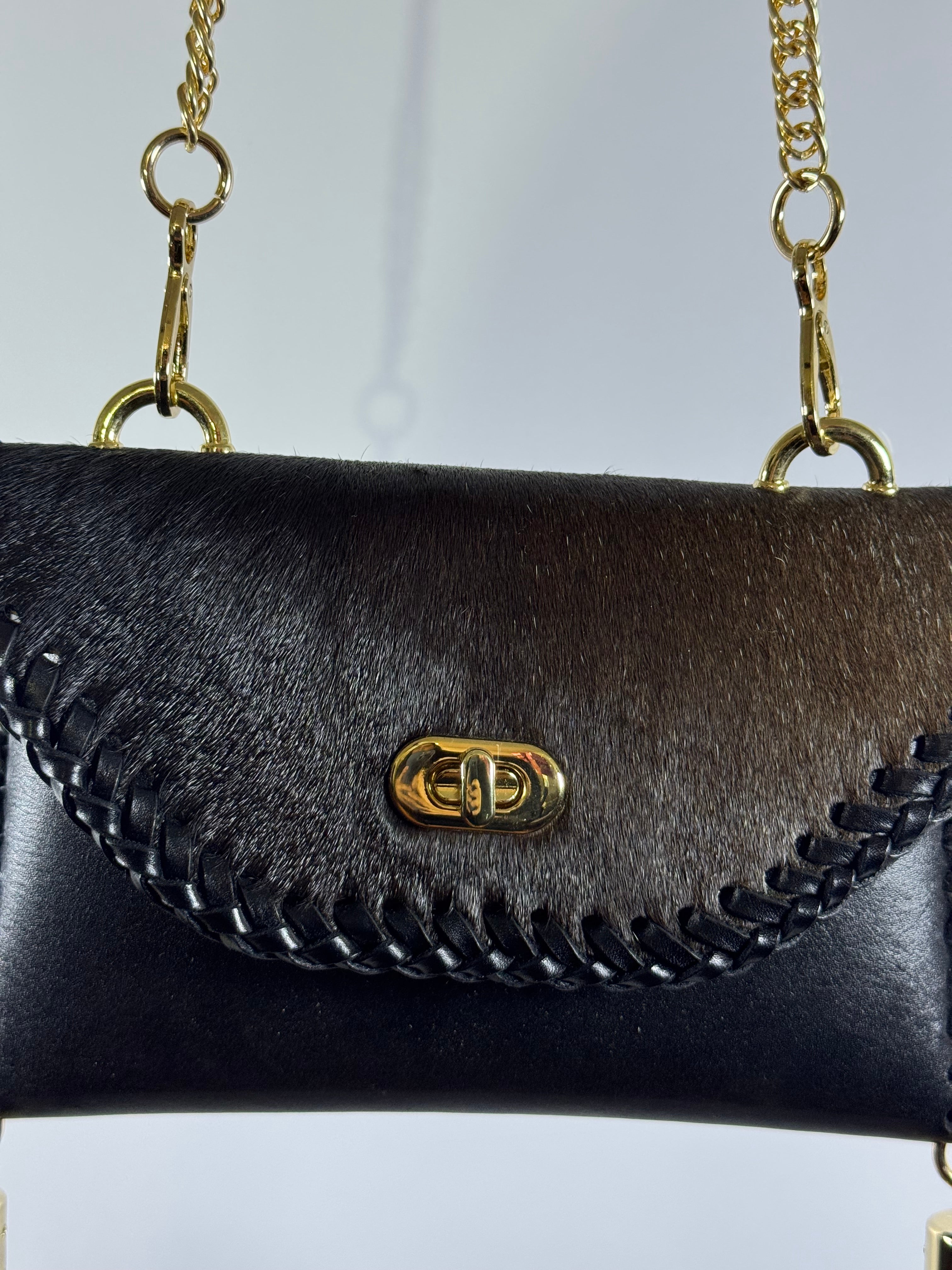 BOLSO IXQUIC BLACK GOLD 21